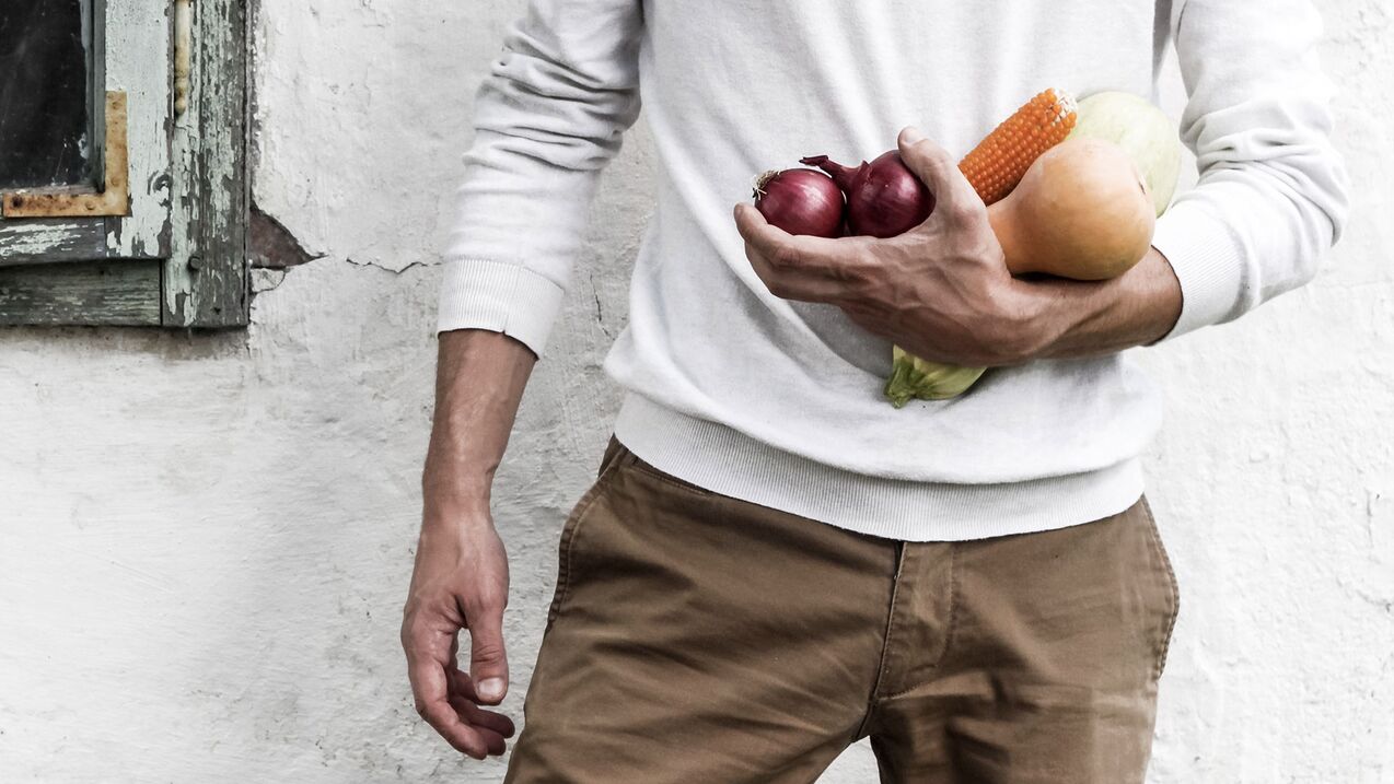 man with healthy food for potency
